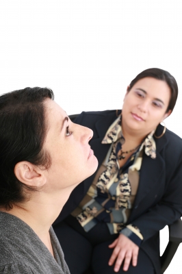 therapist listening to a patient