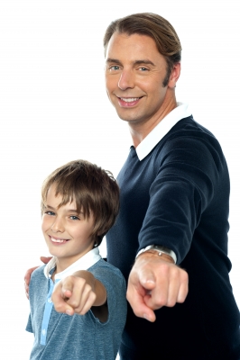 father and son pointing