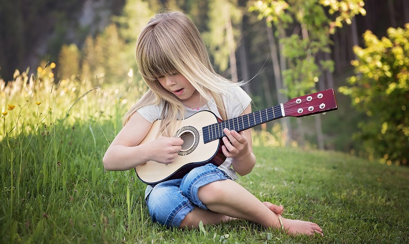 kid playing instrument