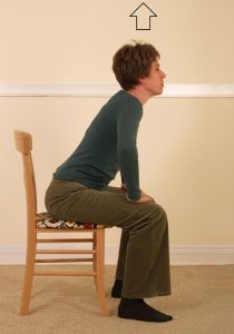 woman struggling to stand up
